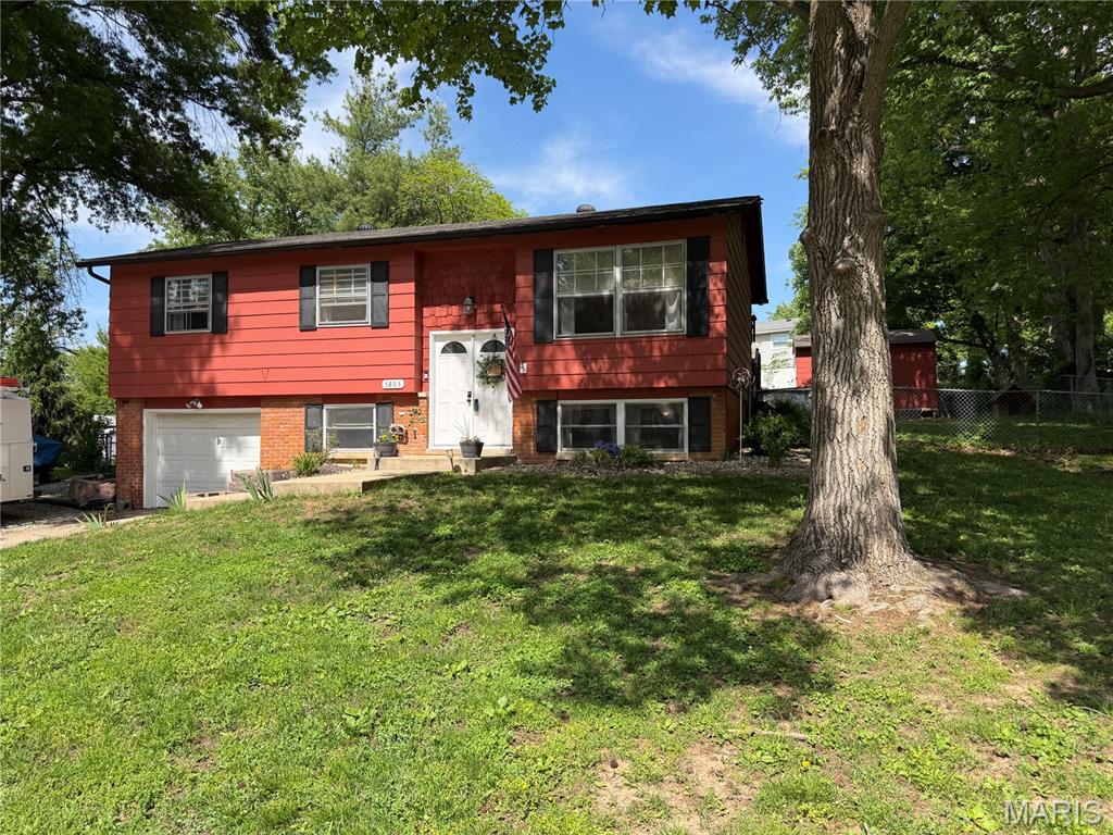 4 Bedroom, 1,655 sq. feet 5803 Piasa Trail Godfrey, IL